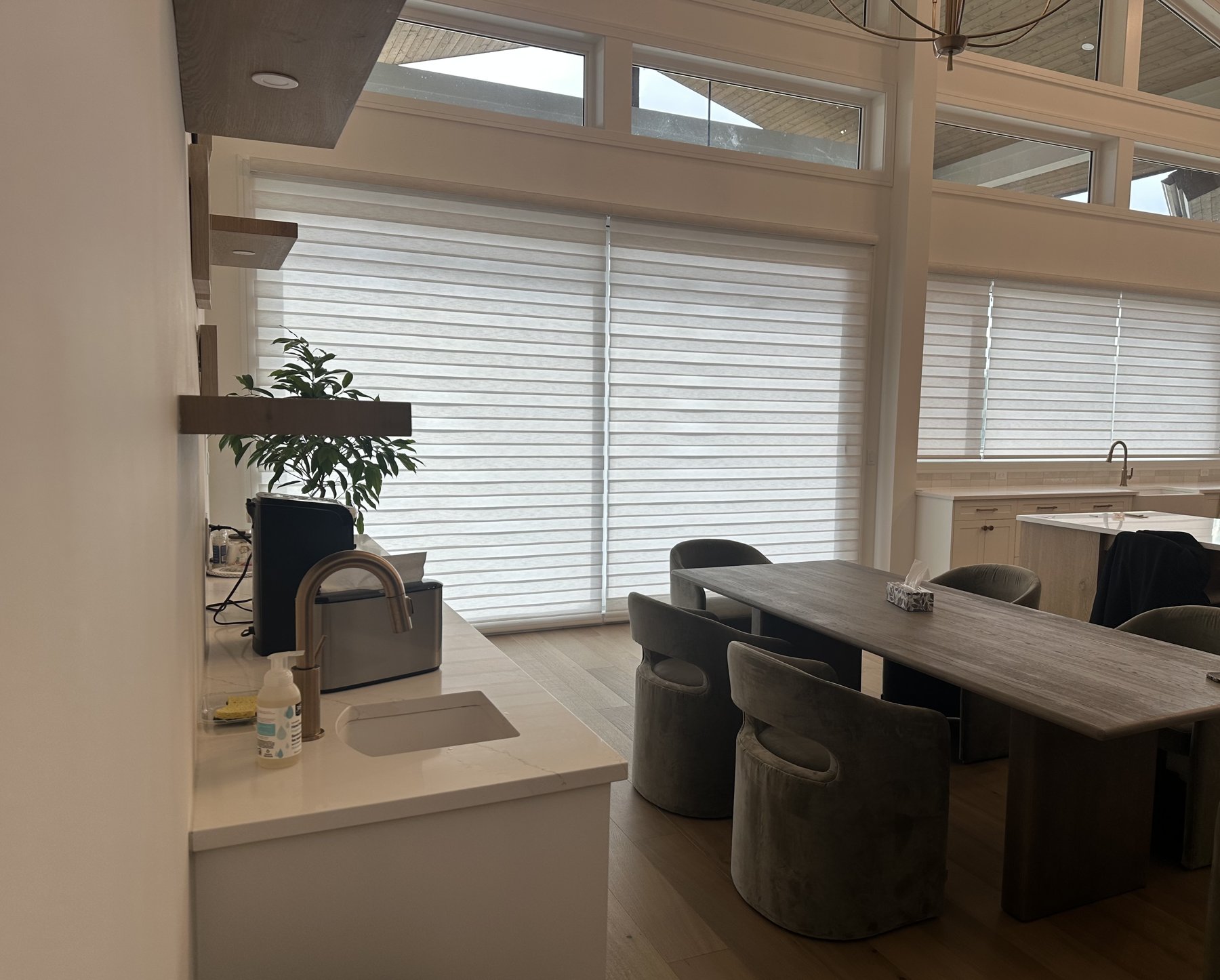 Sheer shades in a kitchen and dining area